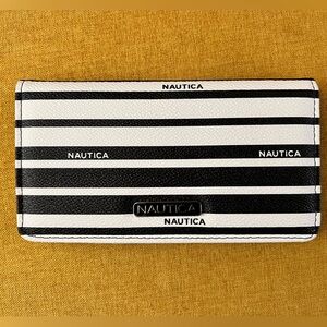 Nautica black and white striped cruelty free faux leather wallet. 7”wide, 4”tall